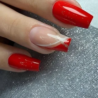 Glossy red nails and a red French tip