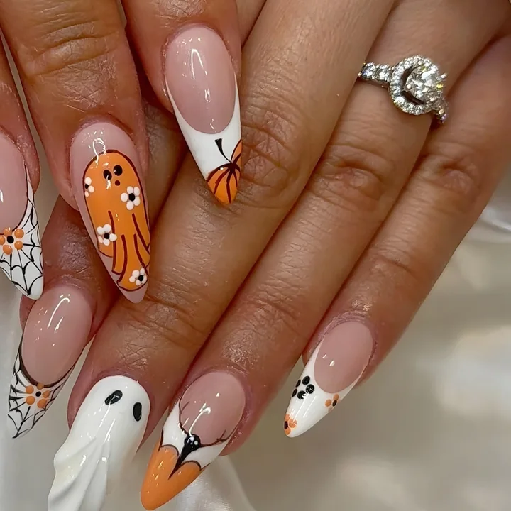 Halloween almond nails with a ghost, pumpkin, cobweb and orange flowers